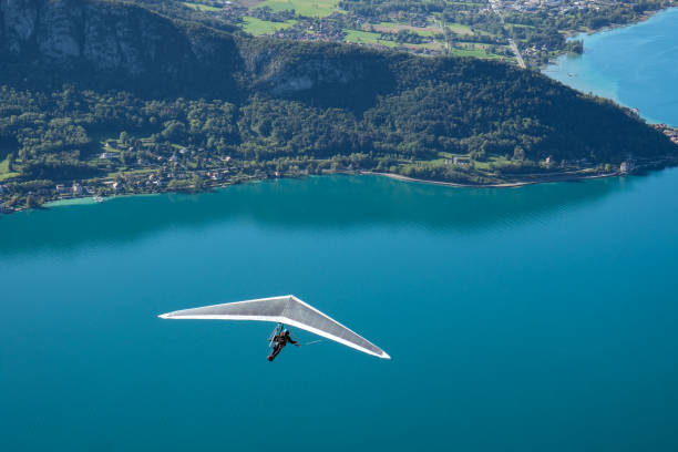 Hand gliding above Annecy's lake, France
